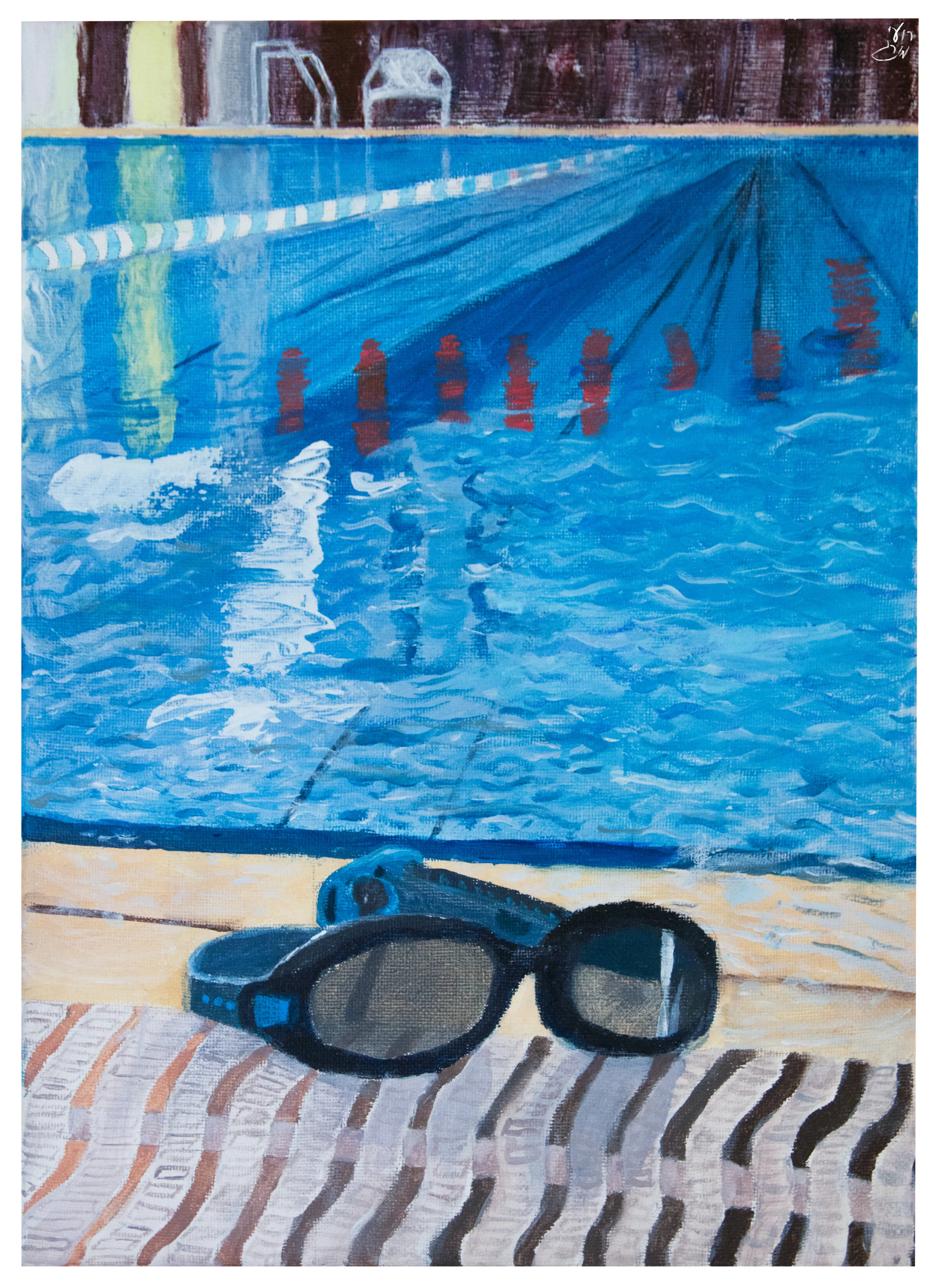 Blue swimming pool water with a pair of goggles on the pool edge in the foreground.