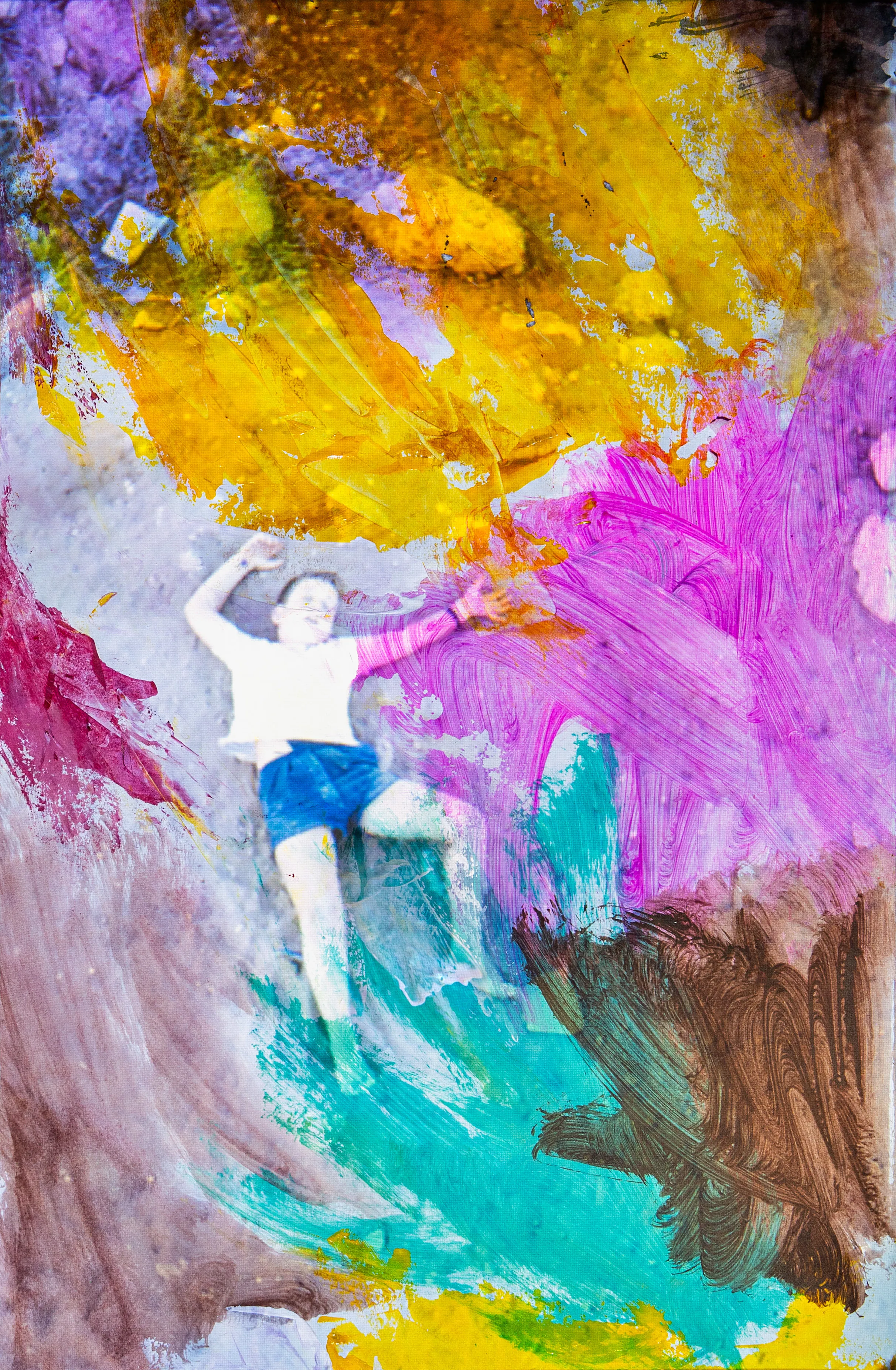 A child in blue shorts leaps or floats in a field of yellow, pink, turquoise and purple paint.